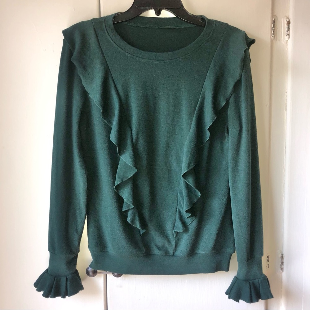 Forrest green long- sleeve jersey shirt with ruffles on the front and cuffs